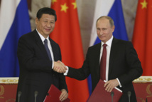 Xi Jinping-a la izquierda-y Vladimir Putin Xi Jinping-a la izquierda-y Vladimir Putin