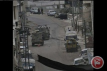 Vehículos militares israelíes en el campo de refugiados Vehículos militares israelíes en el campo de refugiados