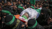 El cadáver de Mazen Faqha, llevado por miembros de Hamas en Gaza El cadáver de Mazen Faqha, llevado por miembros de Hamas en Gaza