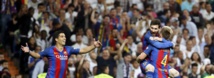 De izquierda a derecha, Suárez, Messi y Rakitic celebrando un gol