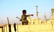 Un miliciano kurdo en Raqa Un miliciano kurdo en Raqa