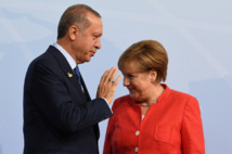 Merkel-a la izquierda-y Erdogan Merkel-a la izquierda-y Erdogan