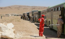 Los autobuses preparados para transportar a los civiles. Los autobuses preparados para transportar a los civiles.