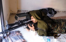 Un miliciano kurdo en Raqqa