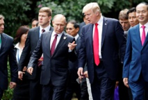 Putin-a la izquierda-y Trump