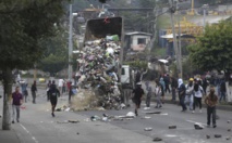 Caos, violencia y heridos en protestas por elecciones en Honduras Caos, violencia y heridos en protestas por elecciones en Honduras