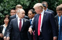 Vladimir Putin-a la izquierda-y Donald Trump
