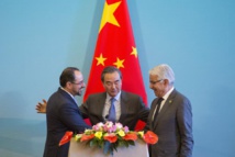 De izquierda a derecha, los ministros de Exteriores de Afganistán, China y Pakistán