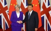 Theresa May y Xi Jinping