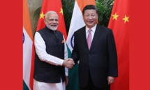 Narendra Modi-a la izquierda-y Xi Jinping