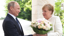 Putin y Merkel