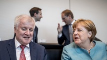 Seehofer-a la izquierda-y Merkel Seehofer-a la izquierda-y Merkel
