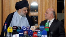 As Sadr-a la izquierda-y Al Abadi As Sadr-a la izquierda-y Al Abadi