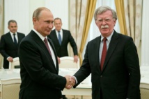 Putin-a la izquierda-y Bolton Putin-a la izquierda-y Bolton