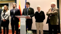 Puigdemont y algunos de los políticos exiliados como él