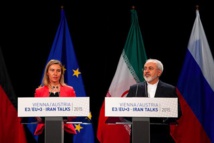 Los ministros de Exteriores de la UE, Mogherini y el de Irán, Zarif.