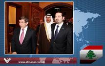 De izquierda a derecha, el ministro de exteriores turco Davutoglu, el ex-presidente del gobierno libanés, Saad Al Hariri y el ministro de Exteriores qatarí, Al Zani