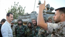 Bashar Al Asad visitando a soldados del ejército