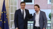 Pedro Sánchez-a la izquierda-y Pablo Iglesias