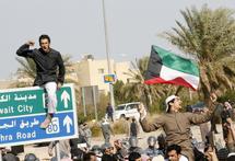 Los manifestantes árabes en Kuwait.