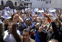 Manifestantes en Damasco, Siria.