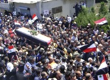 Un funeral multitudinario en Siria.