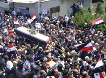 Un funeral multitudinario en Siria. Un funeral multitudinario en Siria.