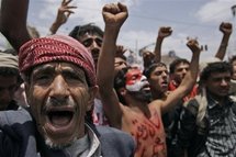 Manifestantes en Saná, Yemen, celebran la partida de Ali Abdala Saleh.