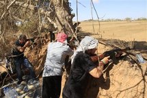 Rebeldes libios en Dafnia, al oeste de Misrata, en Libia. Rebeldes libios en Dafnia, al oeste de Misrata, en Libia.