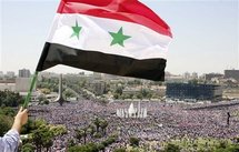 Manifestantes a favor del gobierno en Damasco, Siria.