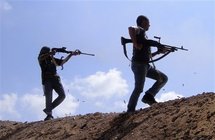 Rebeldes libios en Dafnia, al oeste de Misrata, en Libia. Rebeldes libios en Dafnia, al oeste de Misrata, en Libia.