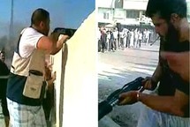 Hombres armados, en Hama, Siria. Hombres armados, en Hama, Siria.