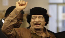 Muammar Al Gaddafi.