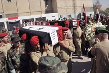 Funeral de policías y soldados sirios. Funeral de policías y soldados sirios.