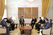 Bashar Al Asad, con diputados rusos.