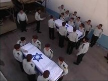 Los ataúdes con los cadáveres de Ehud Goldwasser y Eldad Regev.