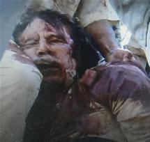 Muammar Al Gaddafi.
