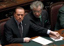 Silvio Berlusconi, a la izquierda, y Umberto Bossi, hoy, en el parlamento italiano, en Roma, Italia.