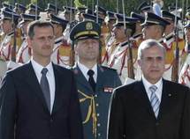 El presidente sirio, Bashar al Asad, izquierda, y el libanés, Michel Suleiman