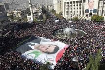 Manifestantes partidarios del gobierno, en Siria.