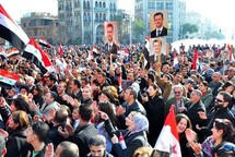 Manifestantes partidarios del gobierno, en Damasco, Siria.