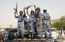 Soldados sudaneses celebran la retirada sursudanesa de Heglig.