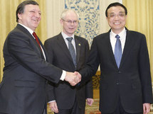 Li Keqiang-derecha-con Herman Van Rompuy-centro-y José Durao Barroso.