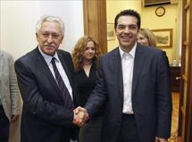 Ftis Kuvelis-izquierda-y Alexis Tsipras