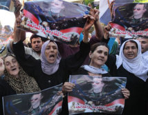 Manifestantes sirias partidarias del gobierno.