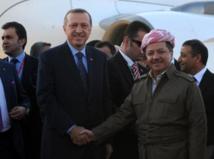 El presidente del gobierno turco, Erdogan, y el presidente del gobierno kurdo en Irak, Barsani