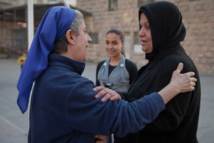 Una monja cristiana y una musulmana.