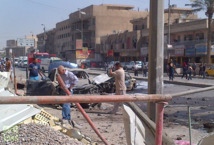 El lugar de la explosión de un coche bomba, en el barrio de Karrada, en Bagdad. El lugar de la explosión de un coche bomba, en el barrio de Karrada, en Bagdad.