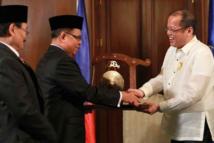 Benigno Aquino-a la derecha-y Murad Ebrahim Benigno Aquino-a la derecha-y Murad Ebrahim