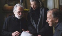 Michael Haneke,a la izquierda, con los protagonistas de la película